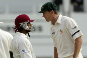 Ramnaresh Sarwan of the West Indies and Glenn McGrath of Australia confront each other